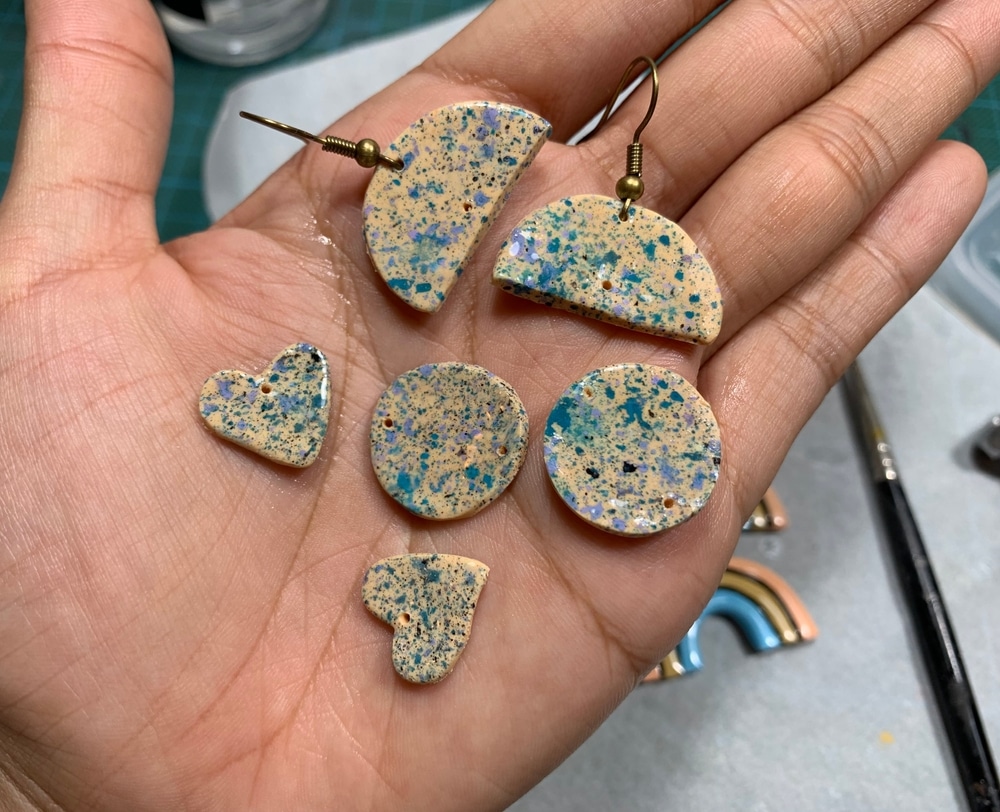 A Hand Holding Diy Polymer Clay Earrings