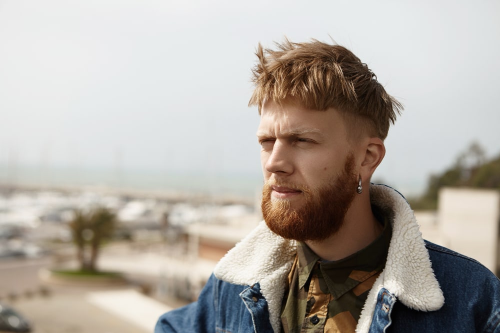 Close Up Portrait Of Fashionable Attractive Young European Man With