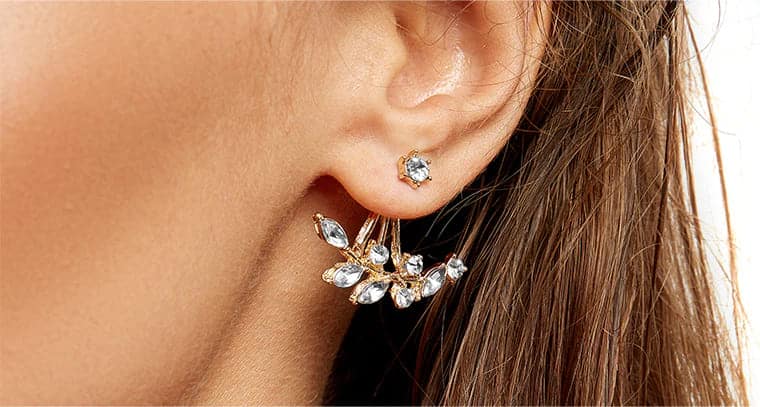 a lady wearing Jacket Earrings in her ear