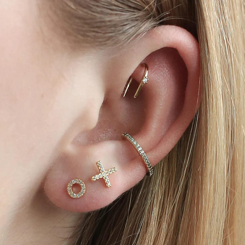 an ear showing Unique Rook Piercings