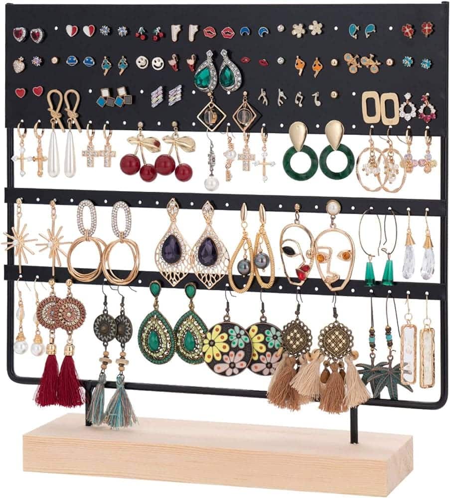 multiple earrings organized on an earrings holder 