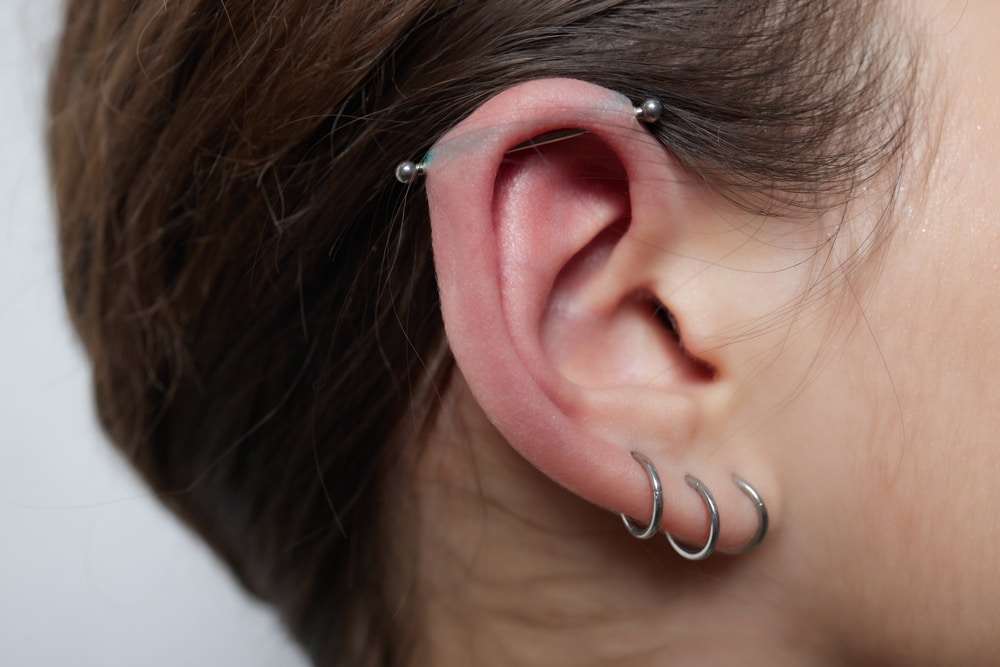 Stretched Lobe Piercing Grunge Concept Pierced Woman Ear With Black