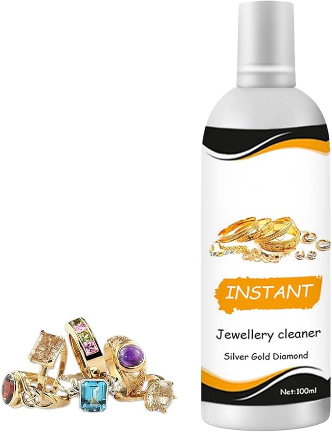 a bottle of jewelery cleaner with jewlery