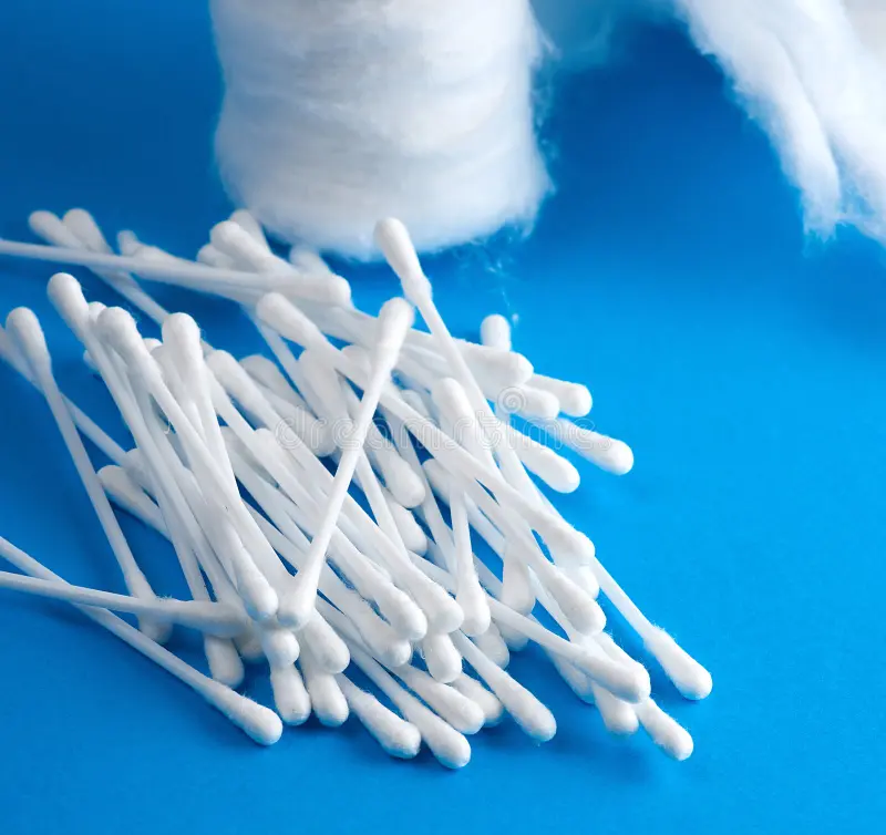 cotton swabs cotton pads gray background