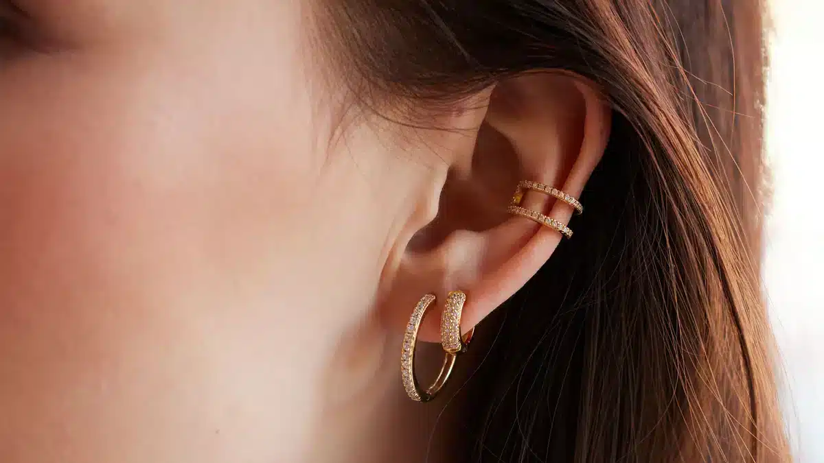 an ear with hoop earrings