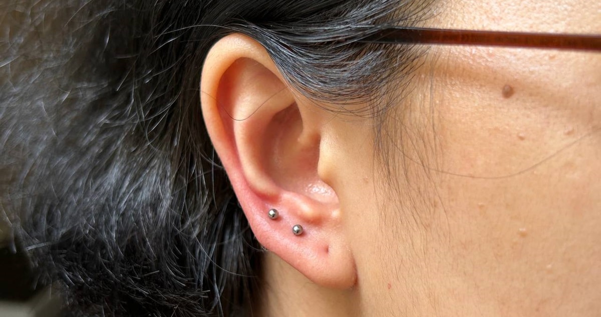 ear close image with mini stud earrings