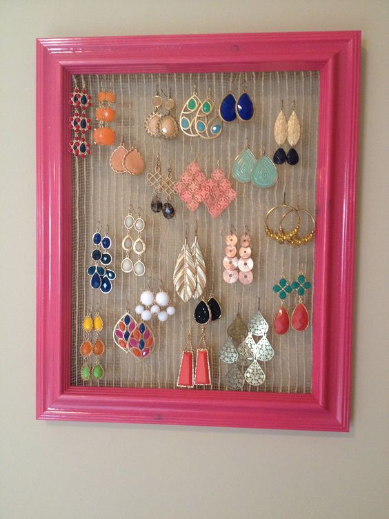 pink earring holder frame with earrings