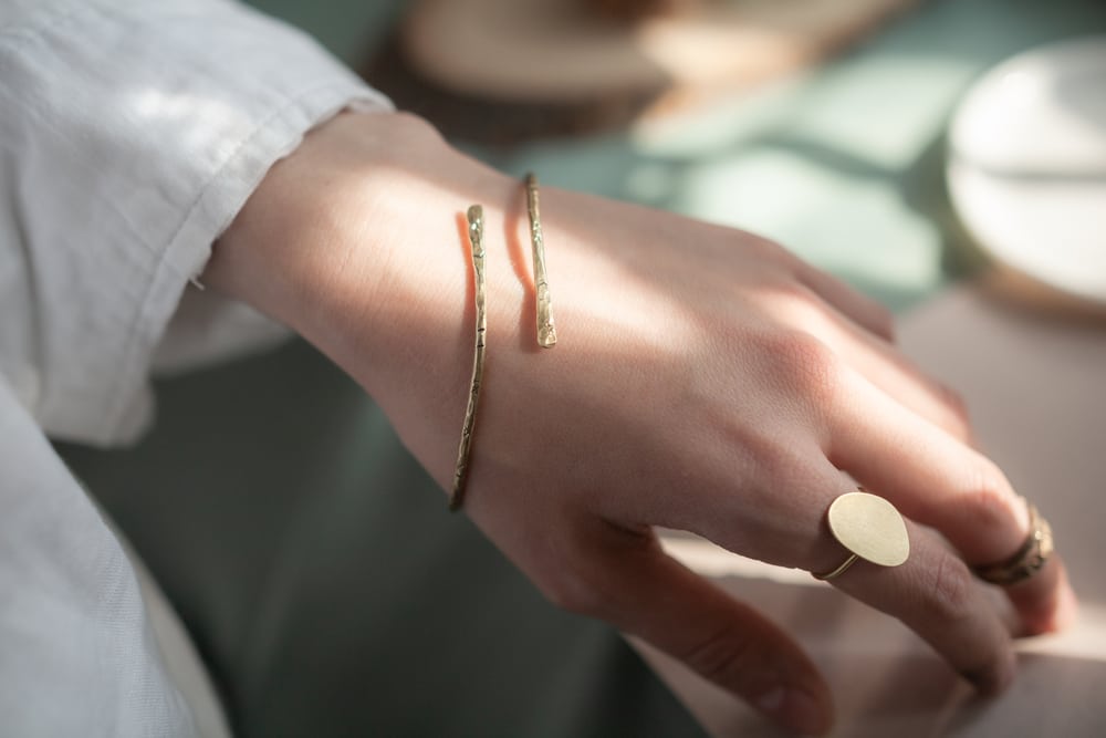 Sophisticated Female Hand With Hammered Brass Copper Ethnic Bracelet And