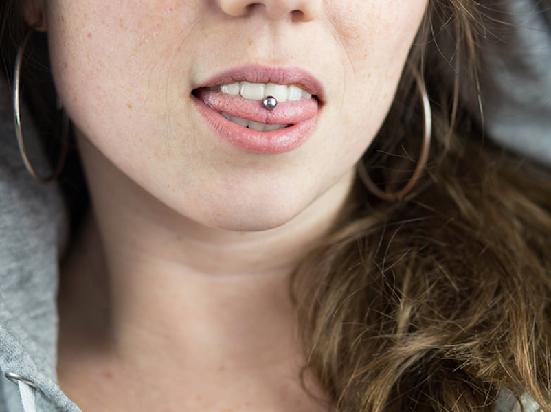 tongue piercing of a girl