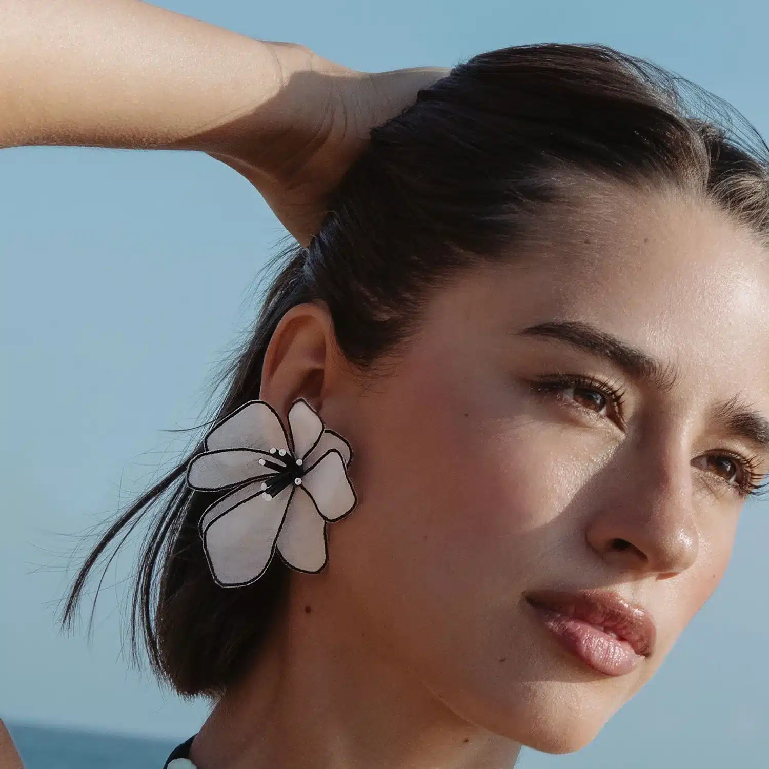 a girl with statement earrings a girl with statement earrings